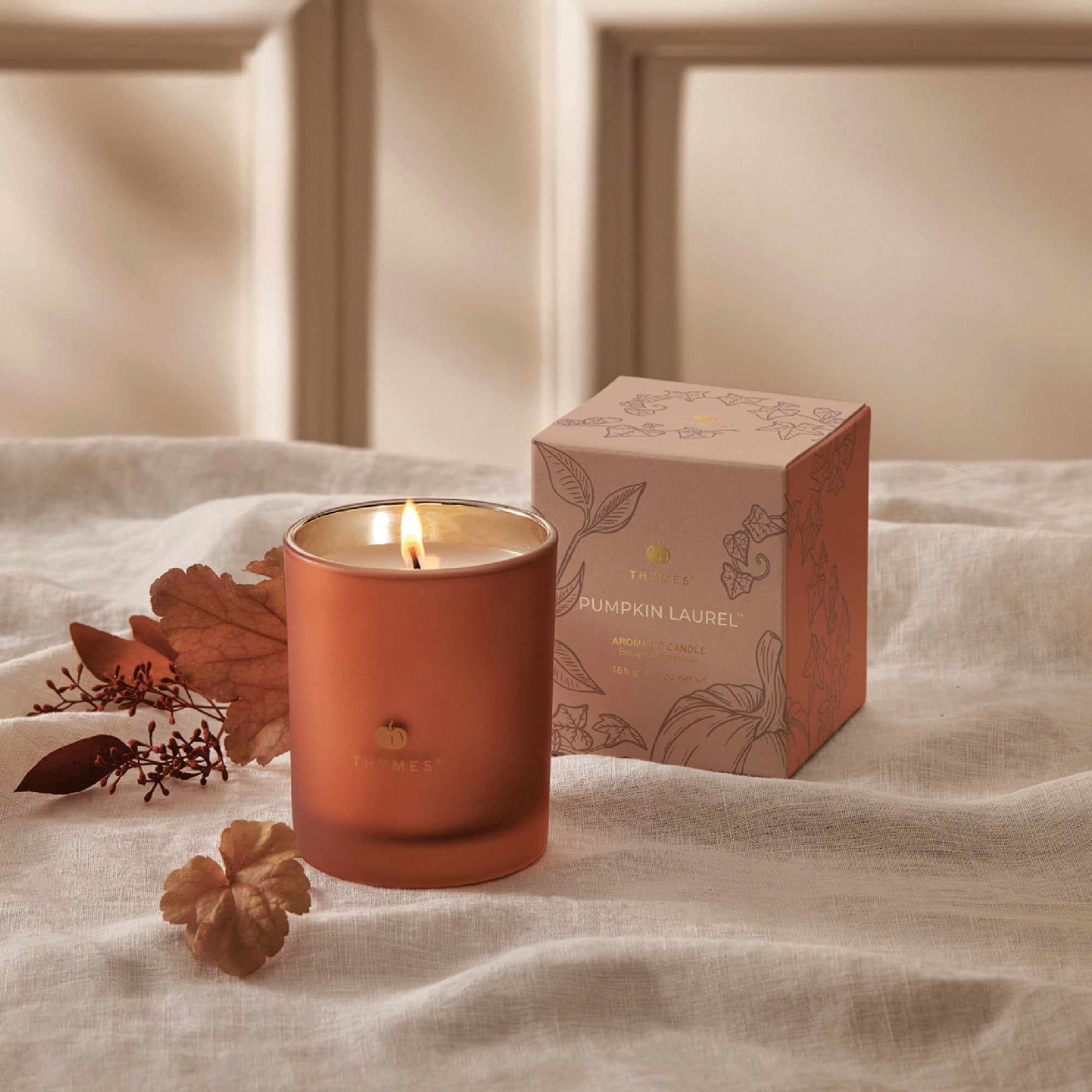thymes-hy23-pumpkin-laurel-6.5oz-candle-web-alt-1.jpg