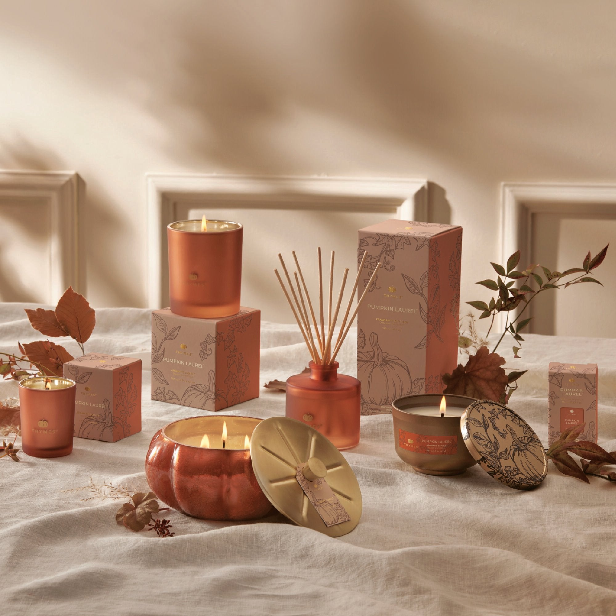 thymes-hy23-pumpkin-laurel-large-candle-web-alt-3_cd3cb0b3-4bd5-406d-b4f2-54a4bf4205b3.jpg